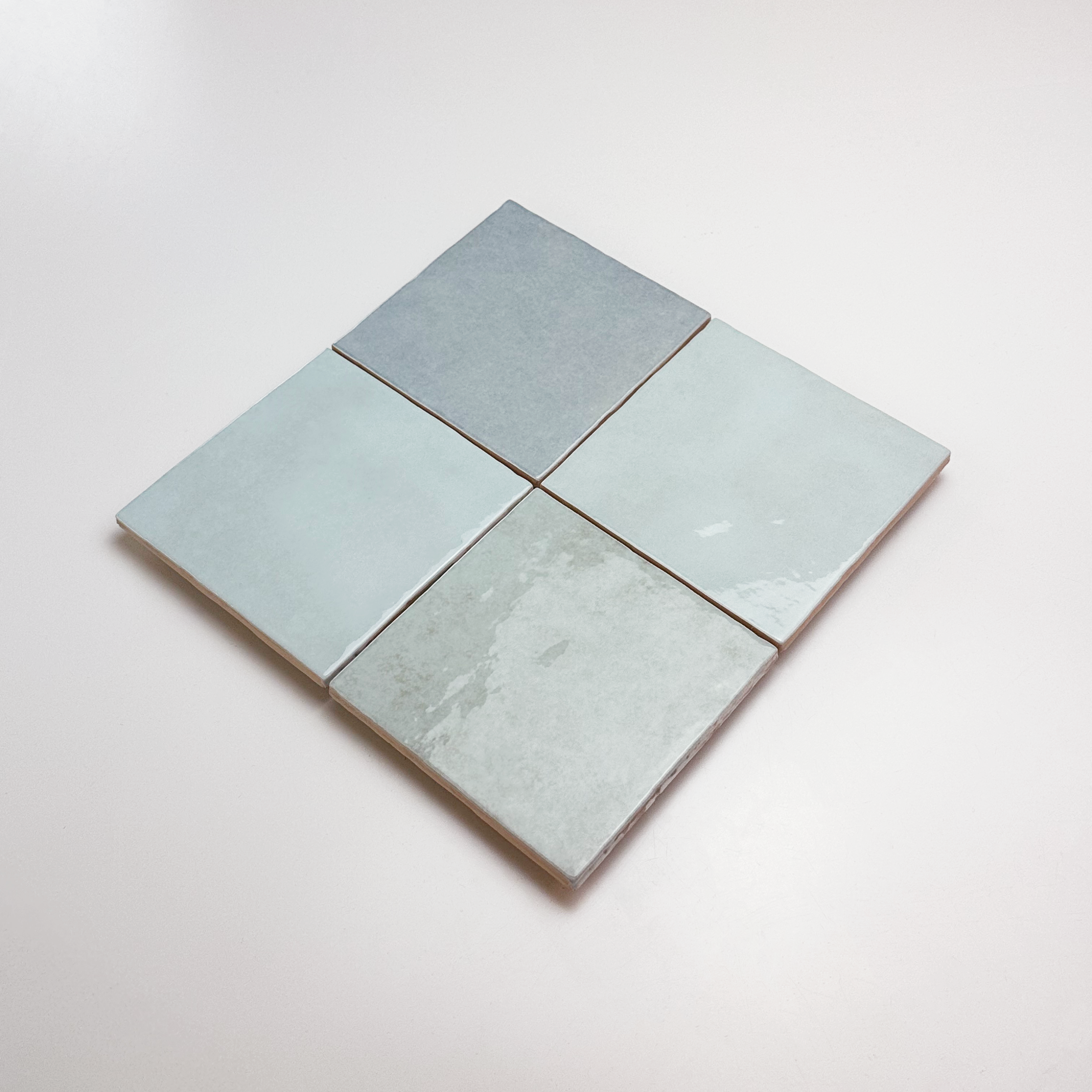 handvorm wandtegel 13x13 licht blauw random glans