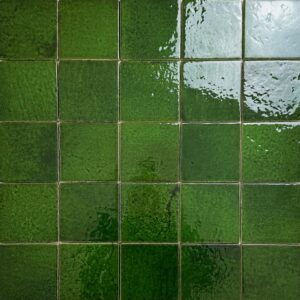 wandtegel menorca donker groen vintage craquele 10x10